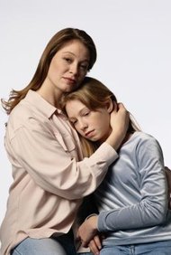 Barbara Penoyar/Photodisc/Getty Images A surviving child may suffer emotionally and financially from a parent's death.