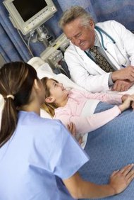 BananaStock/BananaStock/Getty Images A power of attorney can let someone else get medical care for your child.
