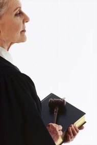 Creatas/Creatas/Getty Images A judge might scrutinize your background before granting a name change.