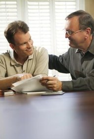 Thinkstock/Comstock/Getty Images Individuals may consider a power of attorney to help with finances.