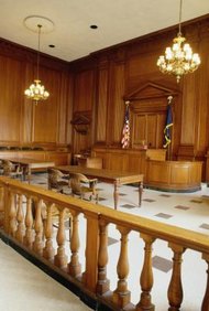 Jupiterimages/liquidlibrary/Getty Images A will may be filed with a court before or after death.