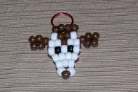 This dog is an example of a beaded animal keychain.