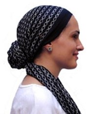 This head scarf style adds flowing length without need for a hair brush. Maintenance-free elegance.