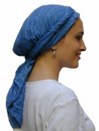 Try on a charming Old World style when you tie your headscarf in the Jersualem twist.