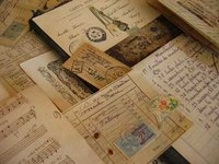 Antique papers, photos and cards should be handled carefully.