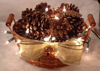 Pinecones and mini lights gently illuminate a cozy fall or winter evening.