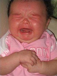 A fussy baby before being treated with gripe water