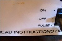 An original Cuisinart admonishes to "read instructions before using"