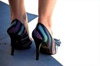 How Does a Woman Wear High Heels All Day?
