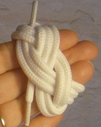 This simple sailor's knot uses a shoelace.