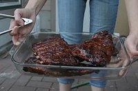 Smoked ribs with BBQ sauce are perfect for your next cookout.