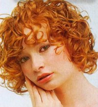 Curly hair and bangs do not often go together because curls can be so unruly.