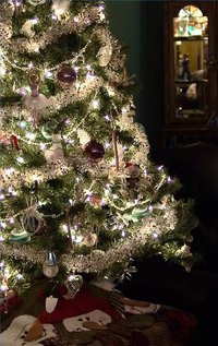 A well-lit tree adds sparkle to Christmas decorations.