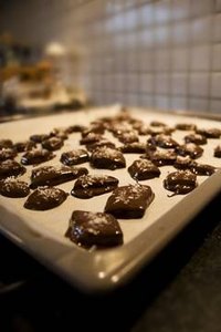 You can purchase wax for your candy making at most supermarkets.