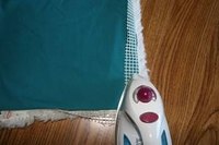 Fold and press canvas to wrong side