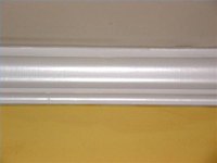 The right crown molding width can give the illusion of height or intimacy to your room.