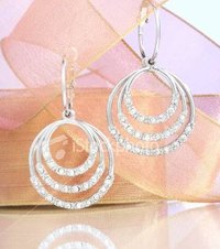 The Reason Women Wear Big Earrings