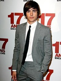A skinny tie and streamlined suit are the modern way for a teen boy to dress up.