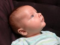 A baby with thrush may be fussy during feeding.