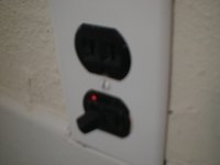Combination outlet switch installed for home use.