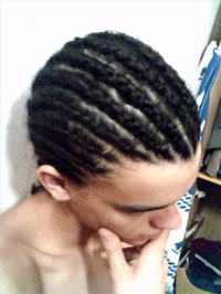 Cornrows are a popular braiding option for men.