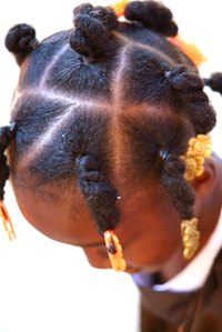 Braids are a practical and cute hairstyle for children.