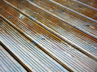 An acrylic coating system makes a deck slip resistant.