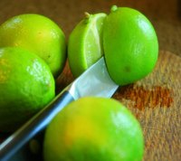 The natural bleaching properties of limes make them effective at lightening dark spots.