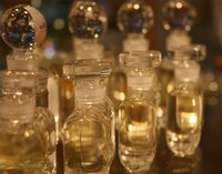 Fill empty perfume bottles with homemade perfume.