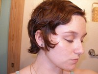 Even very short hair can be styled formally when left down.