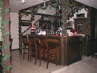 A home bar decorated for Christmas