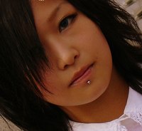 A young woman with a labret piercing