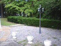 Outdoor lighting can enhance the beauty of your home day or night