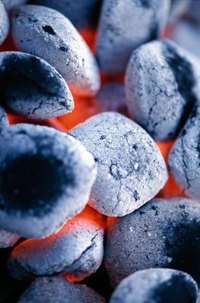 Charcoal is activated with flame so that it's effective for cooking food on a charcoal grill.