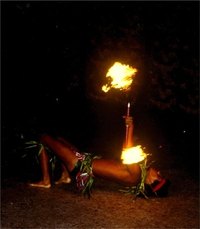 Samoan men perform dances with a fire knife.