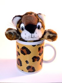 Mug presses fuse original transfer patterns to mugs.