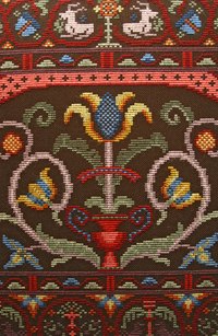 Use iron-on transfer paper to create the tapestry designs you choose.
