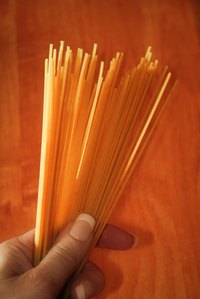 Spaghetti noodles provide a base for a Fear Factor-themed activity.