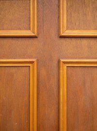 A plain panel door dressed up with decorative molding.