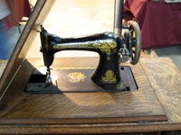 A sewing machine lift can align your sewing machine with the desk surface.