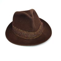 Fedoras can be made out of fabric or paper while looking like hats worn by gangsters.