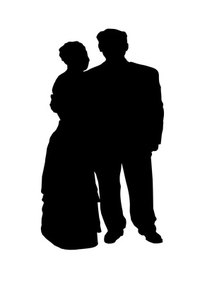Senior Prom walks shine spotlights on elegantly dressed couples.