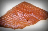 Smoking salmon is a tasty way to preserve it.