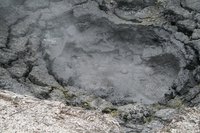 A depression is left in the ground when an aboveground pool is removed.