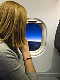 Helpful gifts for someone flying to Australia will keep them comfortable and entertained.
