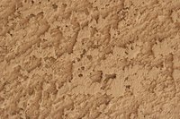 There are several potential causes of stains on exterior stucco.
