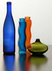 Make a glass plate from several colored glass bottles of the same thickness.