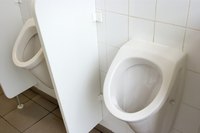 Conventional public urinals waste large amounts of water.