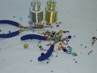 With basic supplies, you can create your own jewelry for locs.