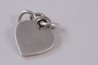 A sterling silver charm can be made with a few jewelry making tools.